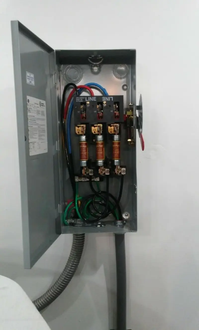 Three-phase disconnect switch installed for Smoke Detector Installation in Woodfin